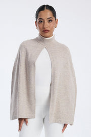 knitted cape with high neck