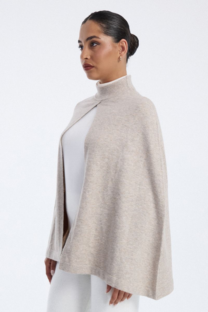 knitted cape with high neck