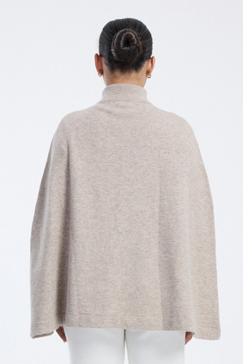 knitted cape with high neck