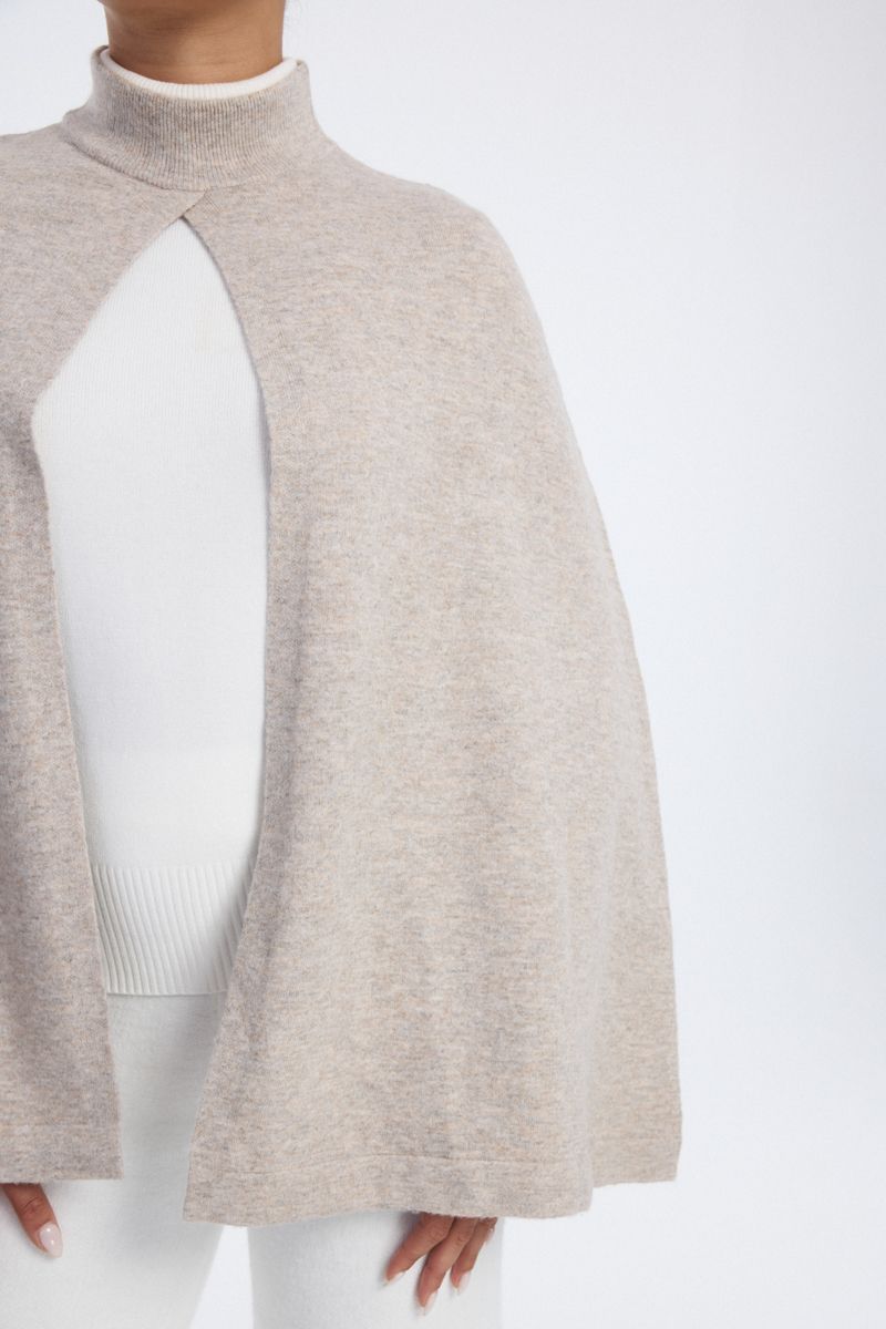 knitted cape with high neck