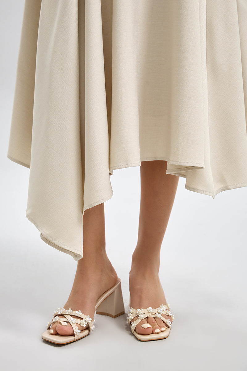 تنورة ميدي بقصّة غير متماثلة