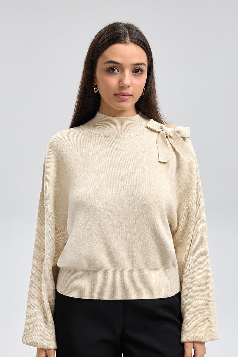 توب تريكو بكتف مكشوف وفيونكة