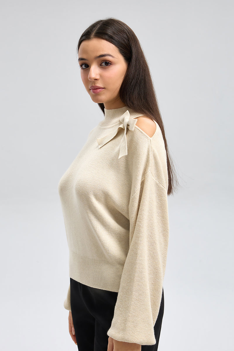 توب تريكو بكتف مكشوف وفيونكة