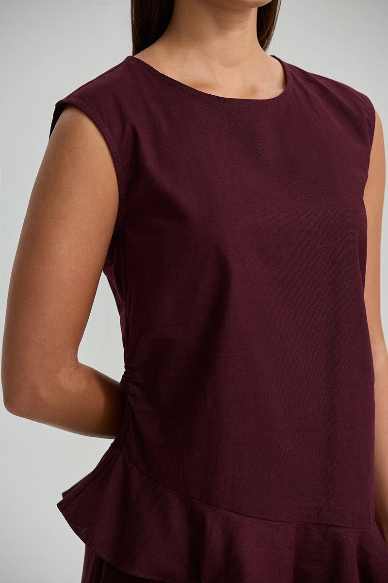 Sleeveless Top With Ruffle Hem