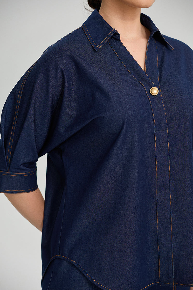 قميص جينز بقصة واسعة