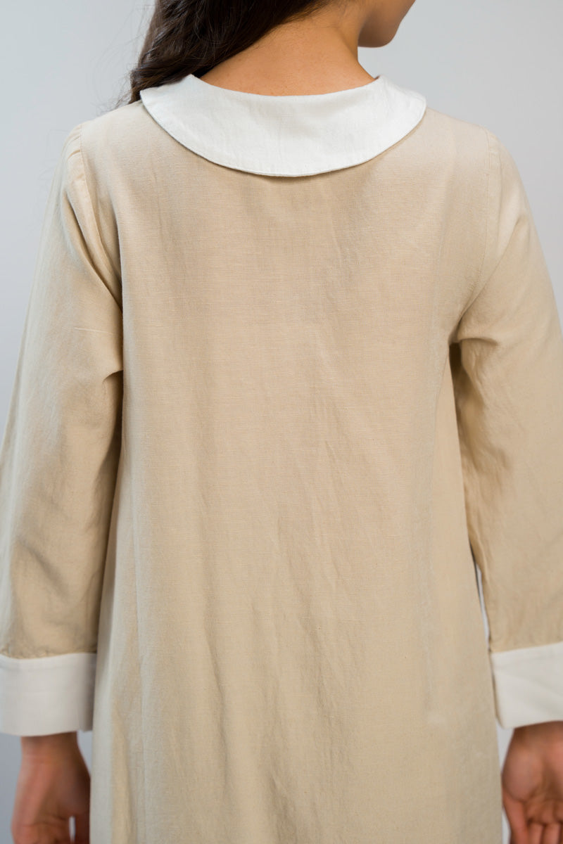 فستان ميدي بقصة غير متماثلة